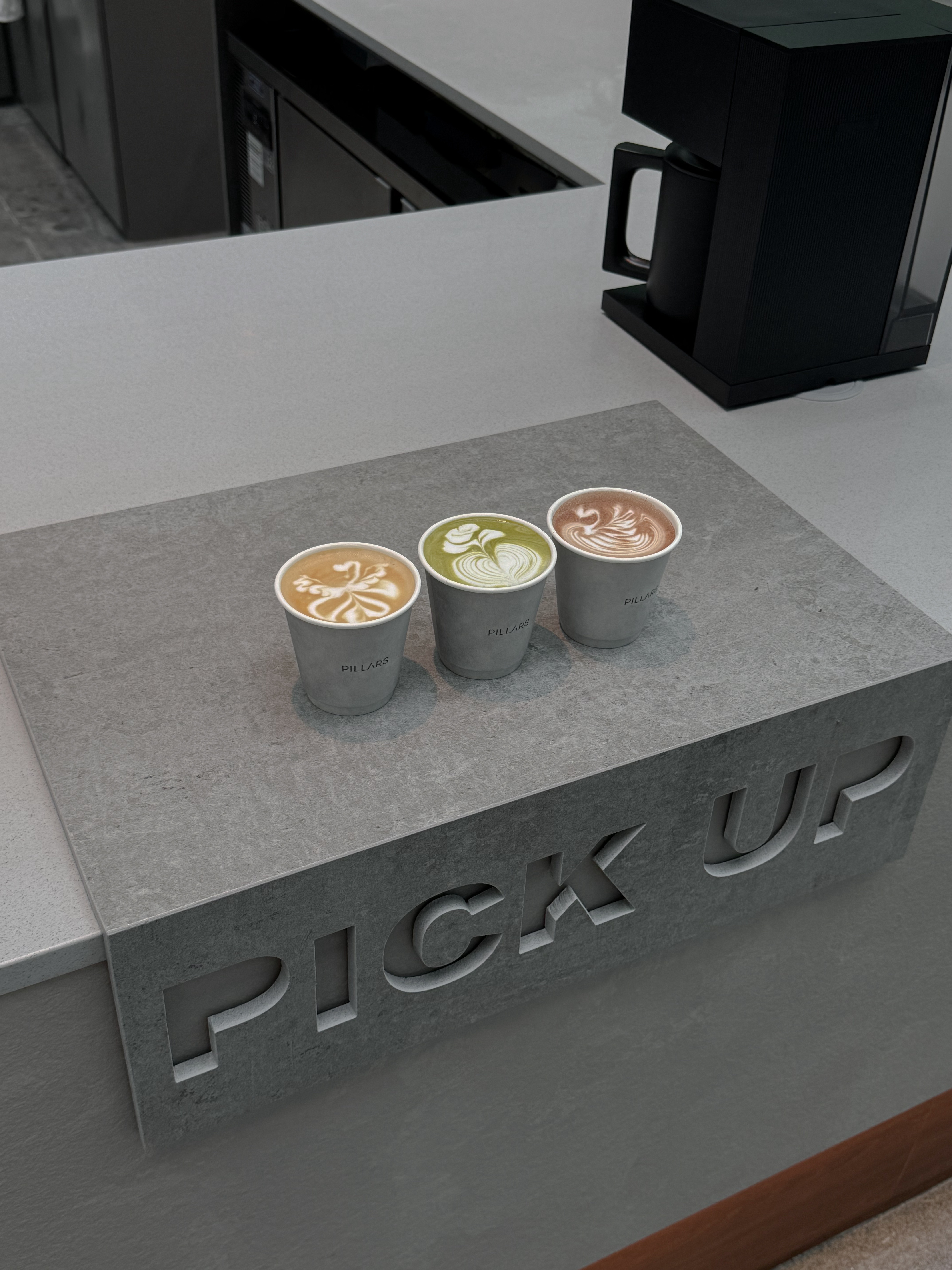 Two cups of coffee served at Pillars Coffee